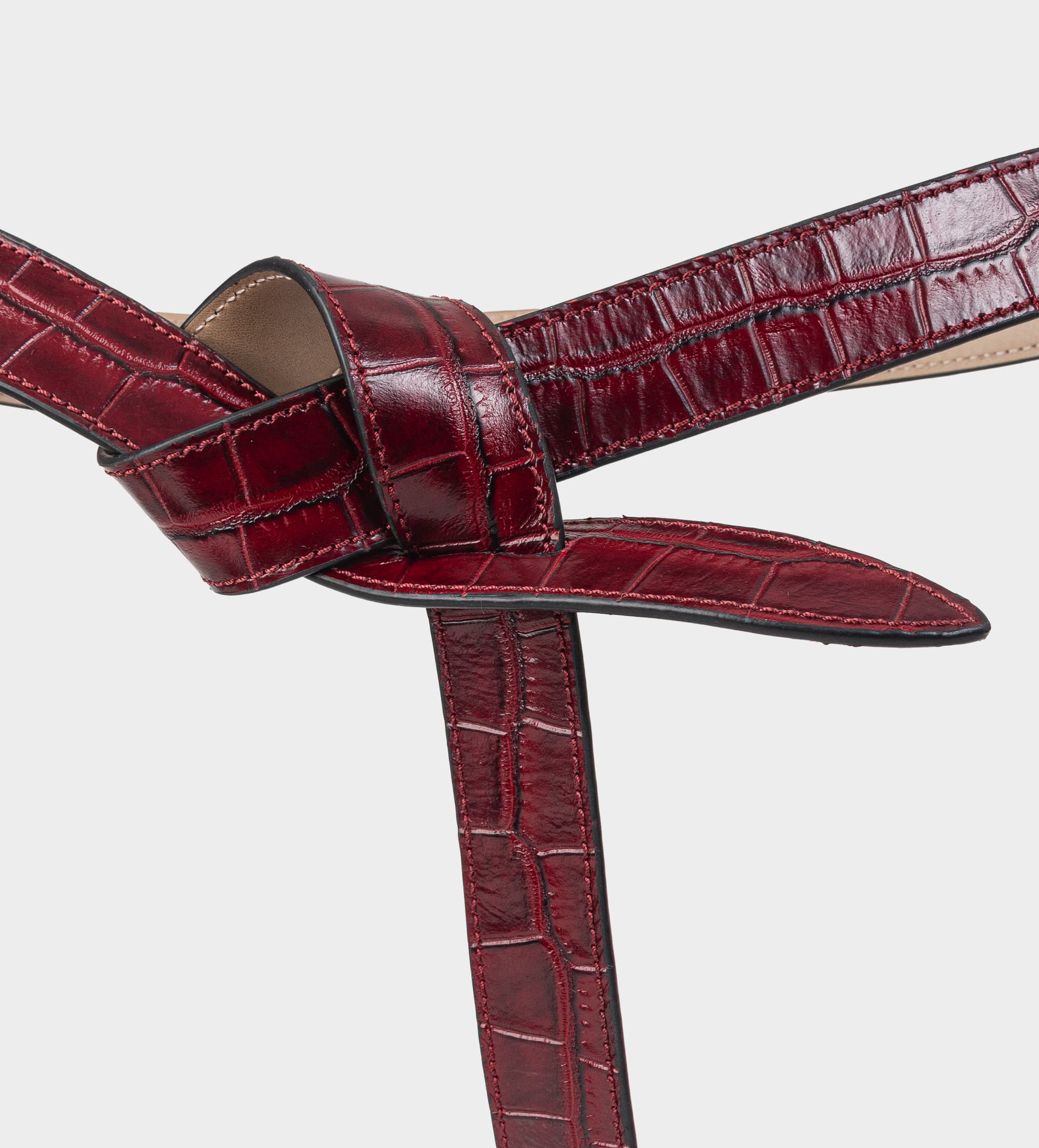 CINTURÓN TEXTURA PIEL VINO