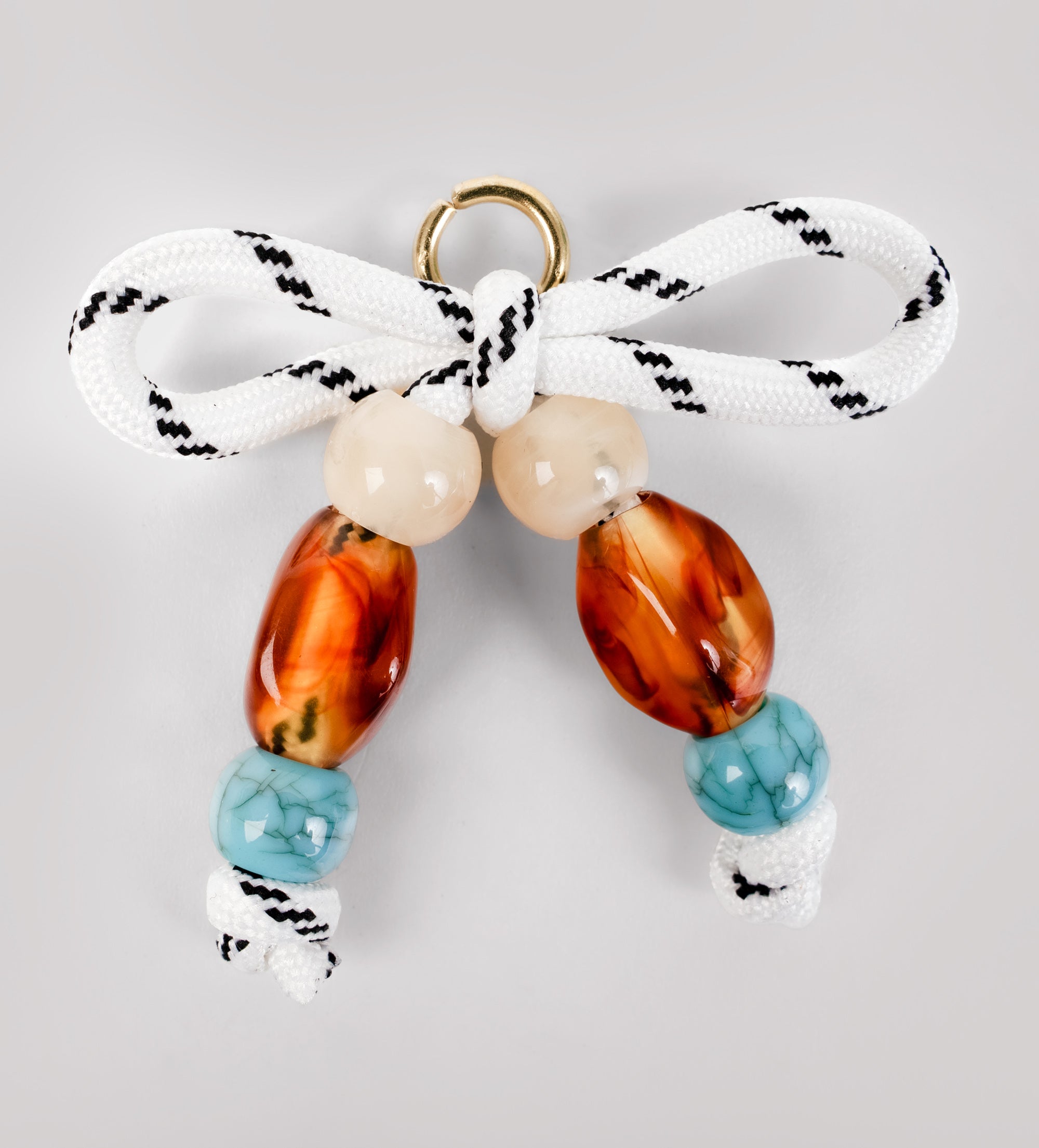 CHARMS SNEAKERS MOÑOS TEXTIL CAREY