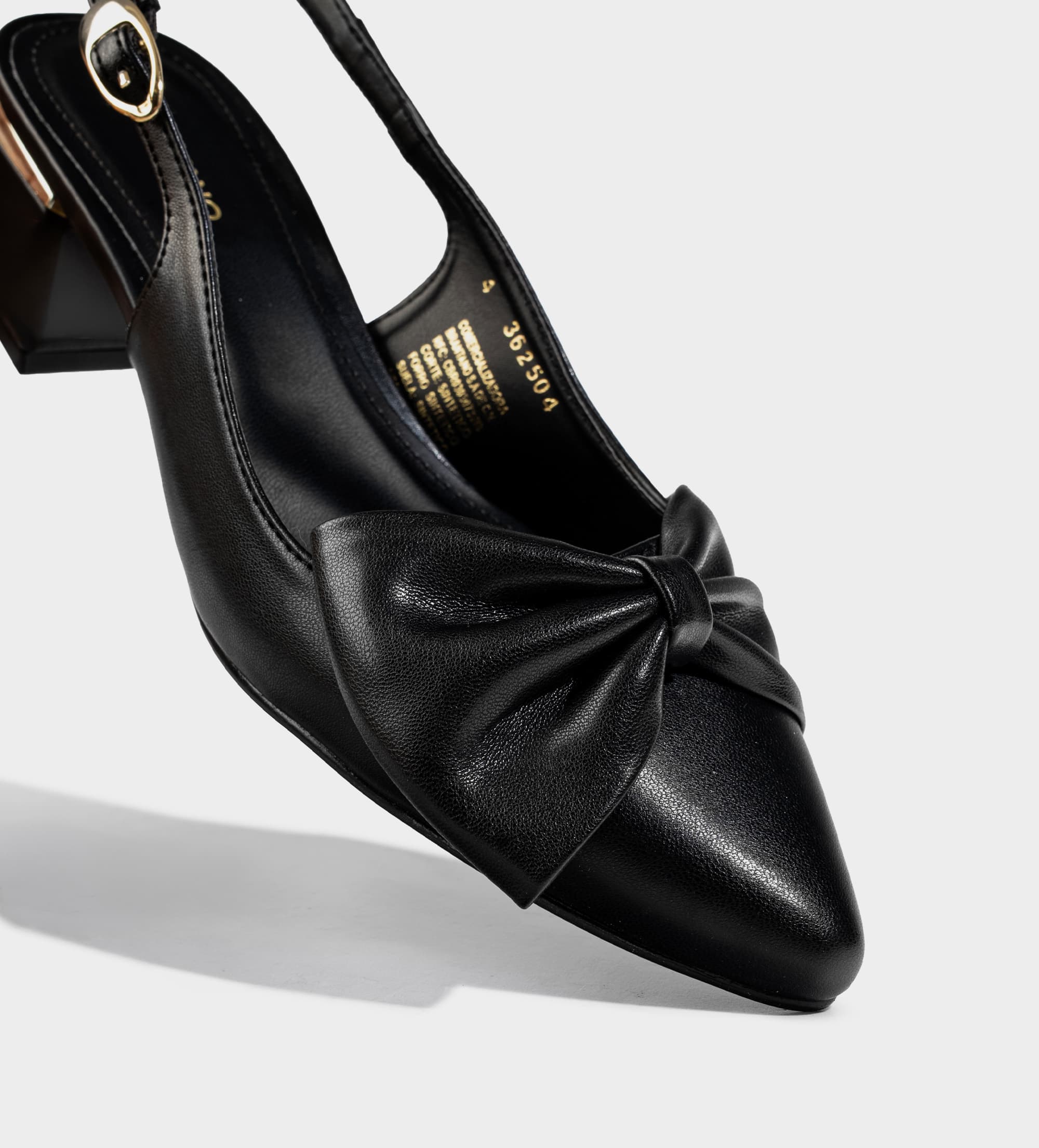 ZAPATILLA DESTALONADA MOÑO NEGRO