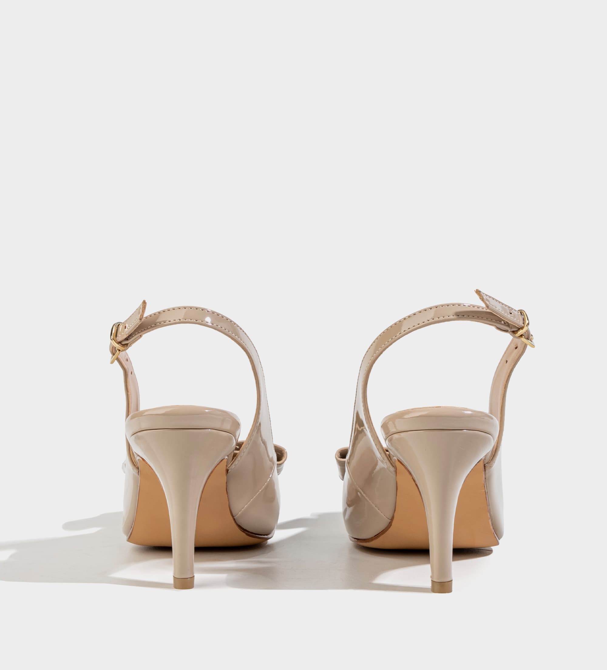 ZAPATILLA DESTALONADA MOÑO CHAROL NUDE