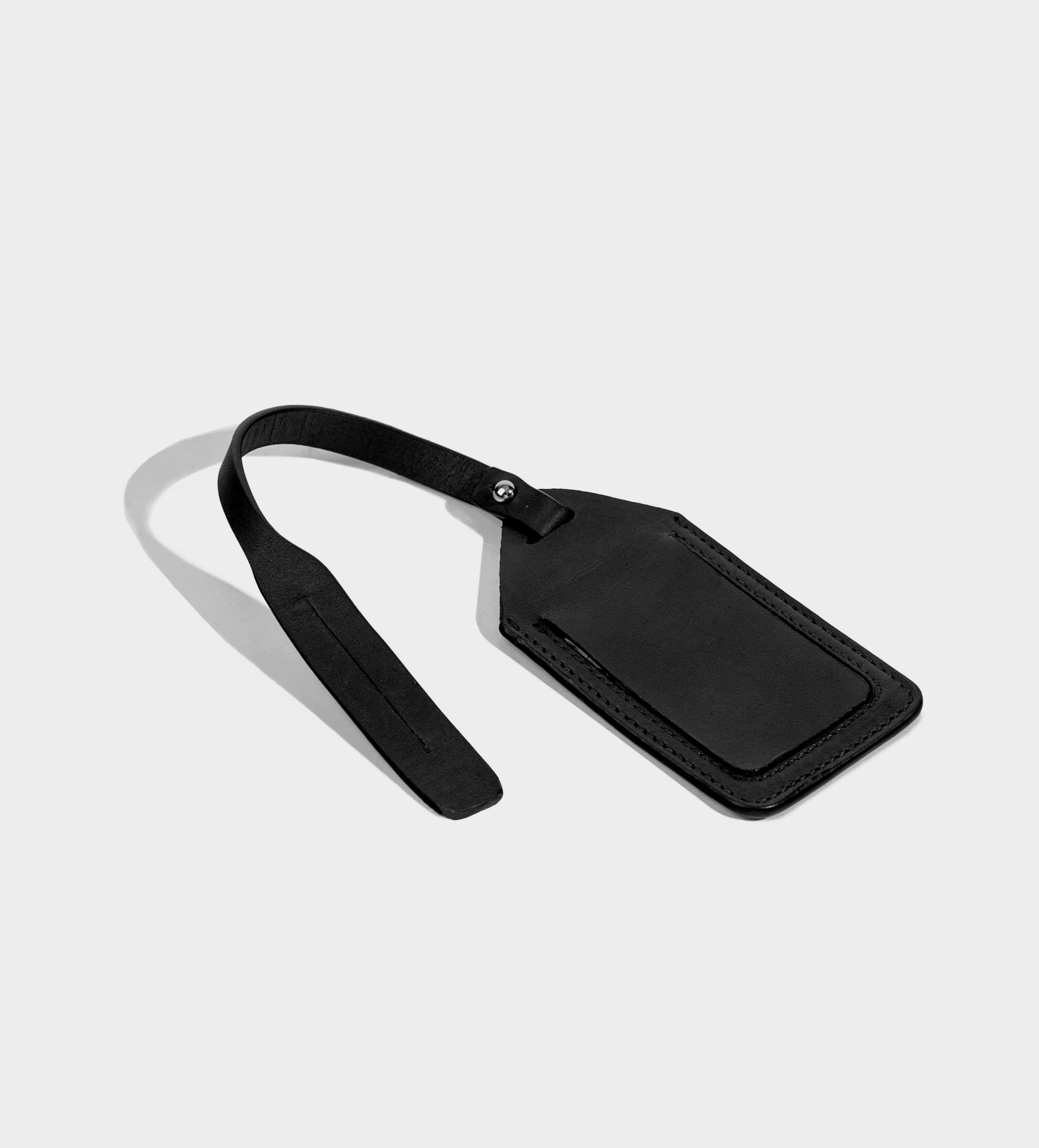 TAG EQUIPAJE CASUAL PIEL NEGRO