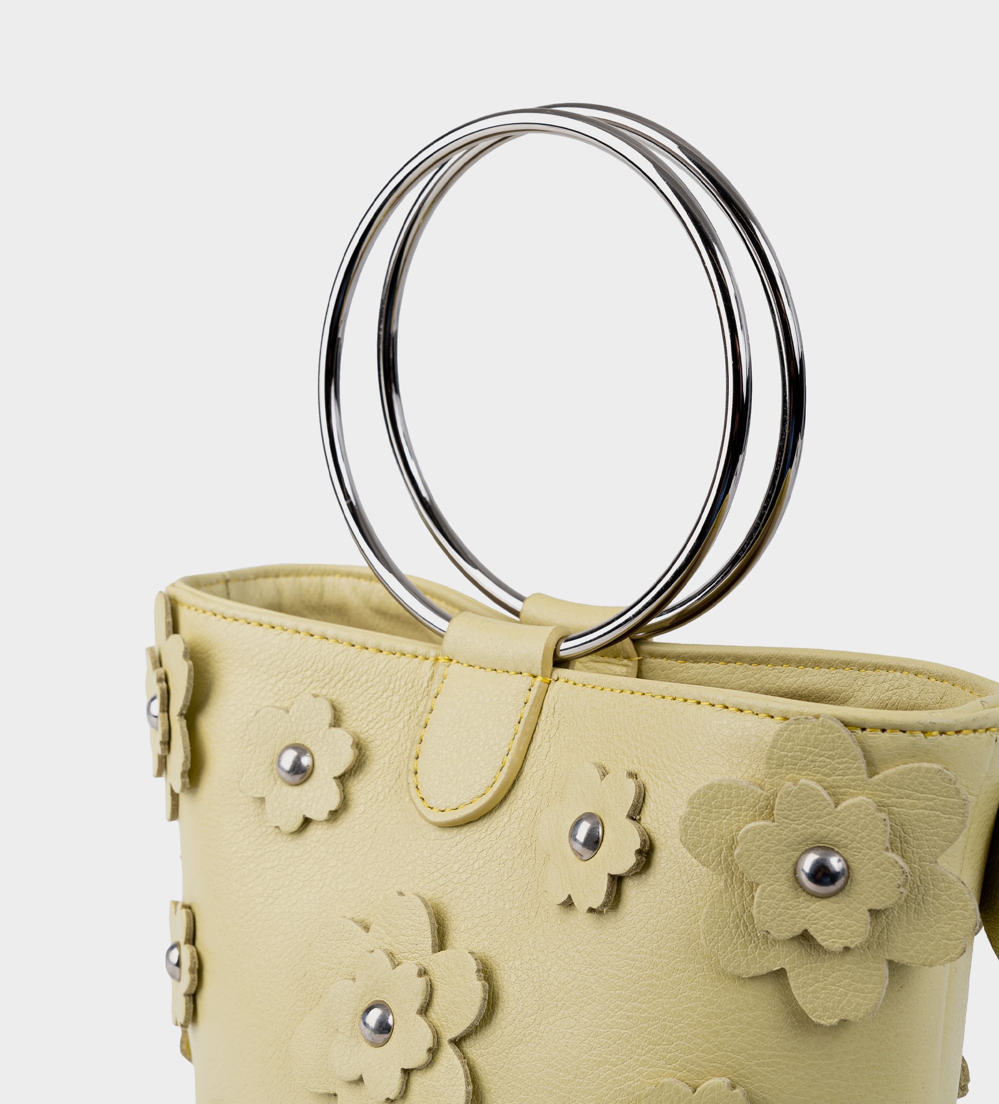 BOLSO BUCKET FLORES PIEL AMARILLO