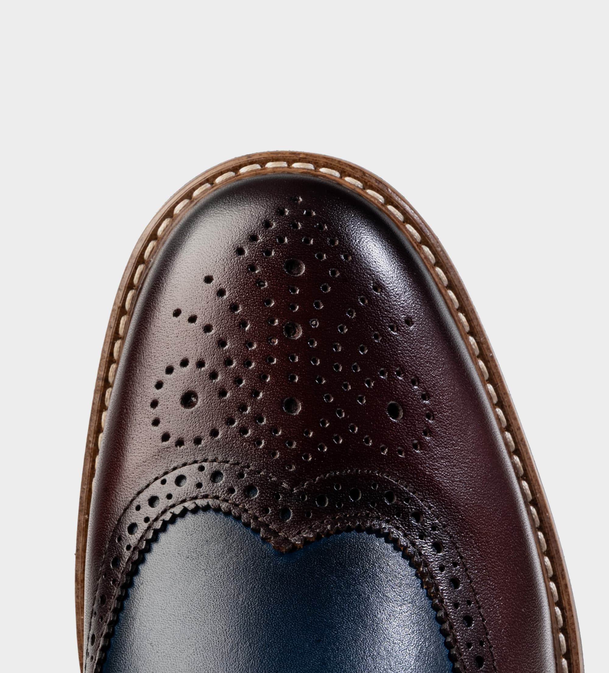 BOTA AGUJETAS BROGUE PIEL VINO CON AZUL